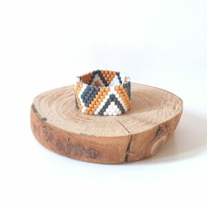 Anillo blanco/terracota/grafito con diseño geométrico