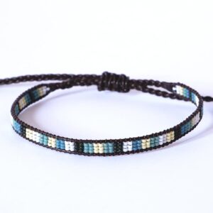 Pulsera unisex de tres filas azul/naranja con diseño de franjas enmarcada en cuero marrón