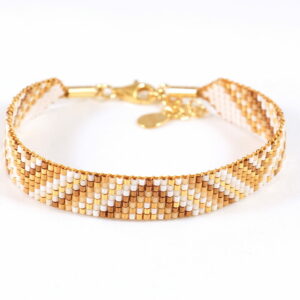 Pulsera de siete filas bronce/oro con diseño de triángulos