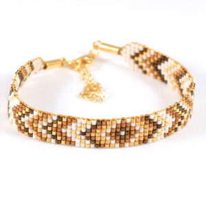 Pulsera de siete filas bronce/oro con diseño de espigas